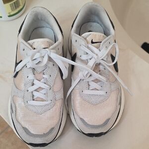 Nike Cream and Black Athletic Shoes